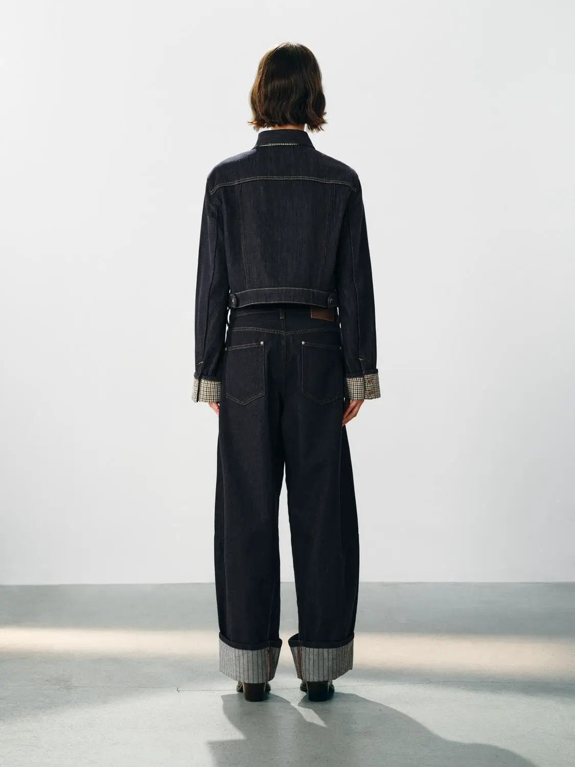 Jeans by Urban Revivo Fashion; dark denim, wide-leg fit with cuffed hems