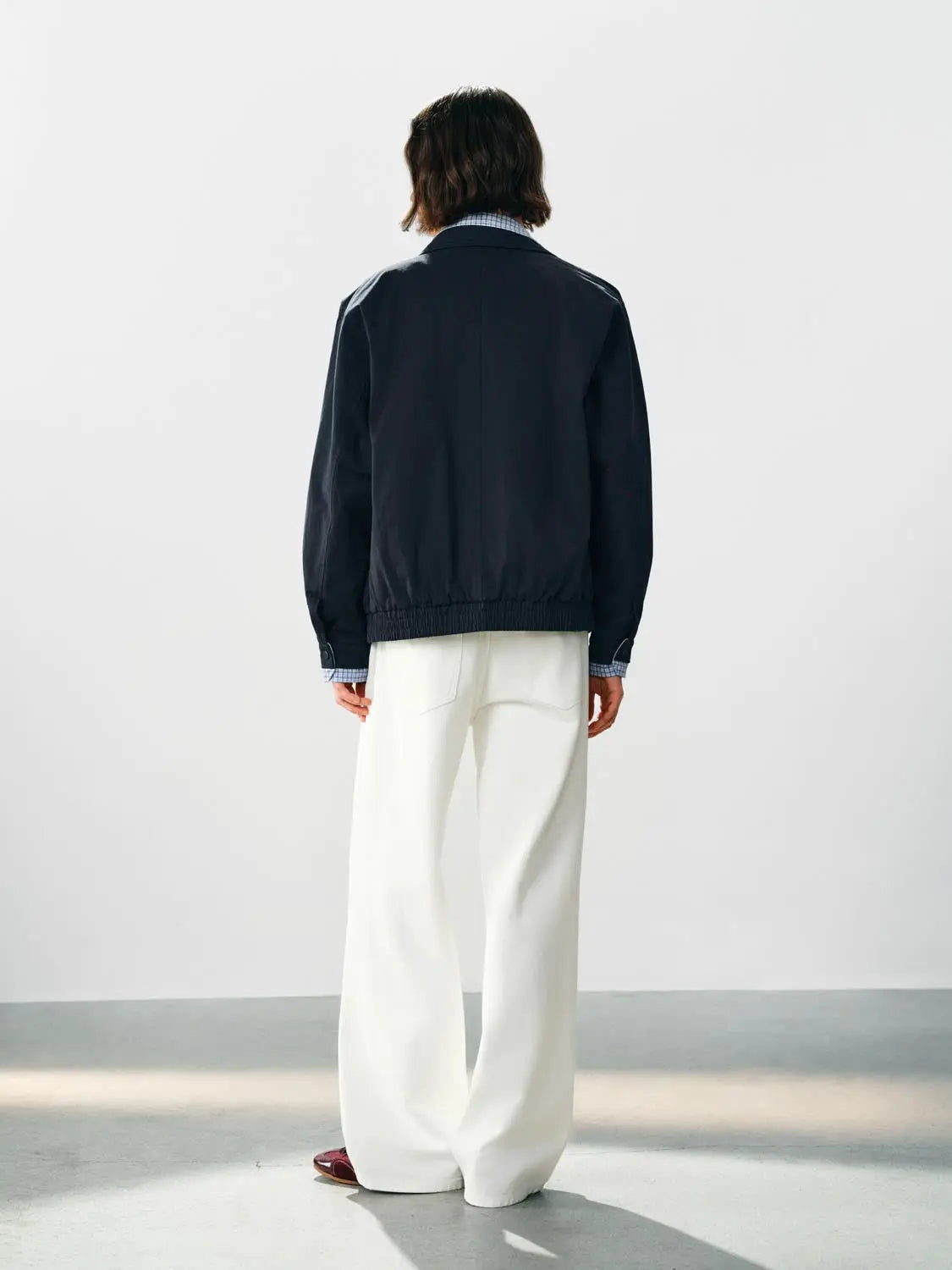 Casual Trousers jeans in white with a wide-leg silhouette, back view