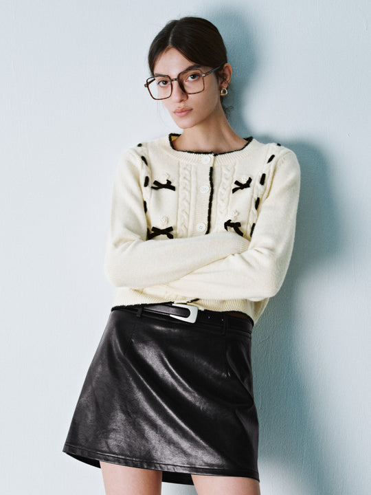 Cardigans tricotés avec décor de nœud