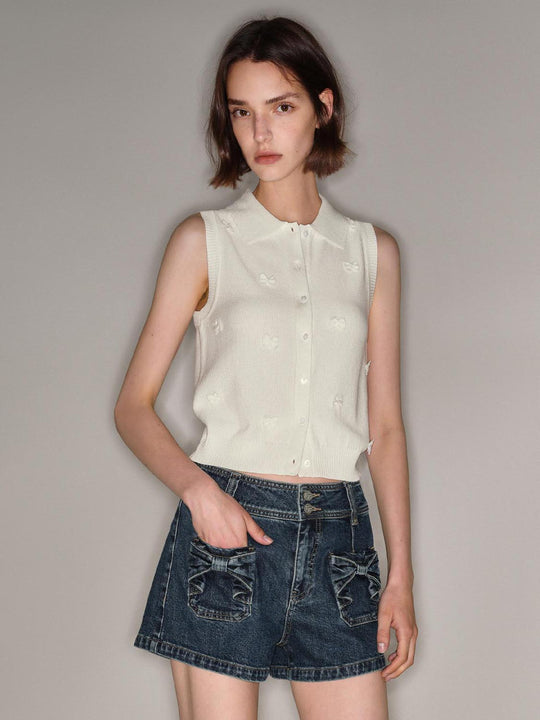 Cardigan senza maniche in maglia a coste con colletto polo e bottoni frontali