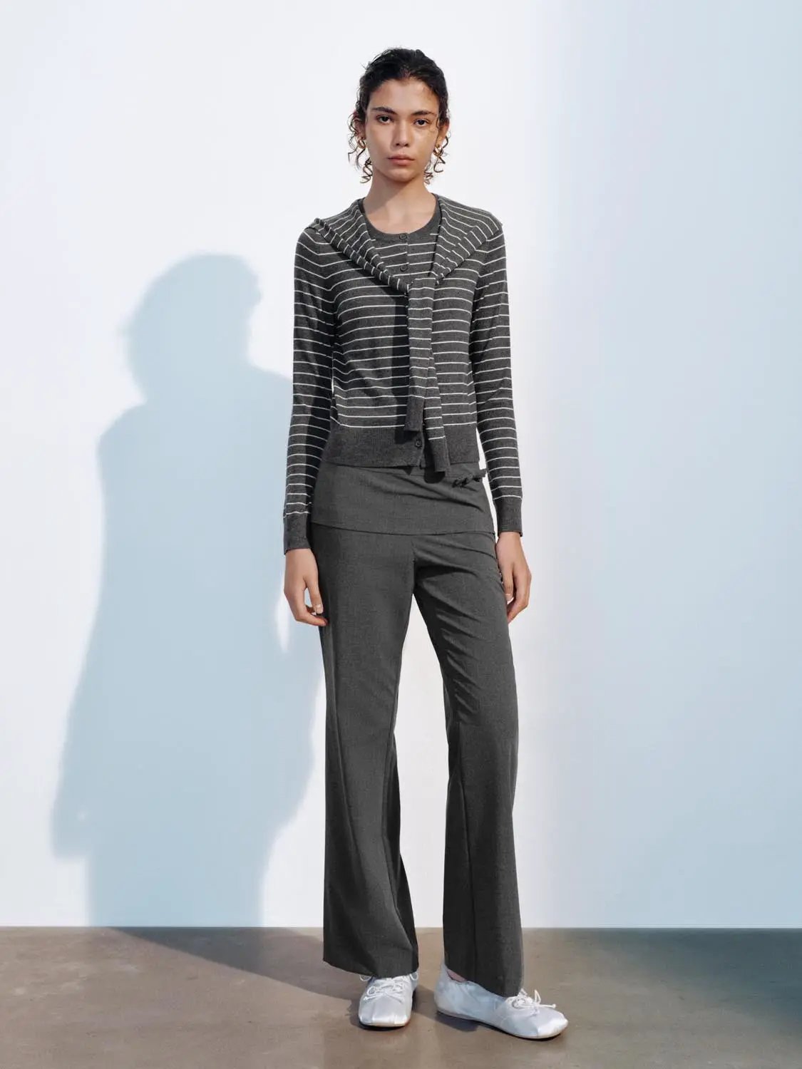 Knit Jacket, gray striped knitted cardigan with long sleeves worn by model in dark wide-leg pants