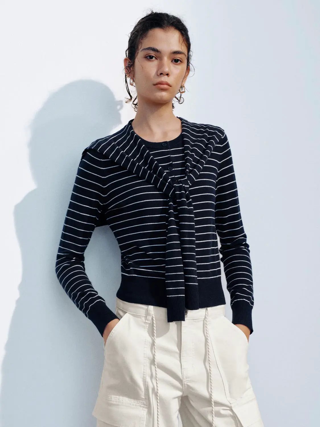 Knit jacket, navy striped cardigan with white stripes, front tie and ribbed cuffs.