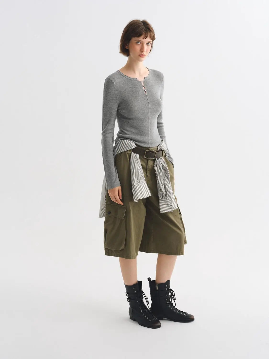 Knit T-Shirt by Urban Revivo Fashion in grey knit, paired with olive cargo skirt and striped waist wrap.