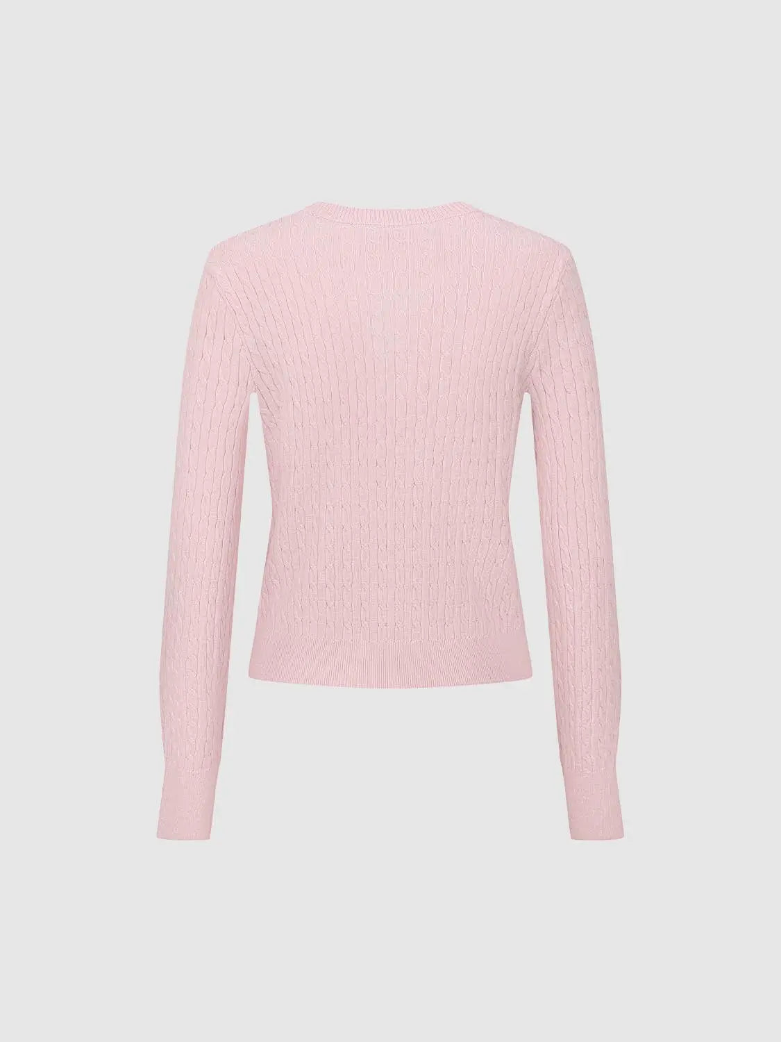 Knit jacket cardigan in pale pink with cable-knit texture, back view.