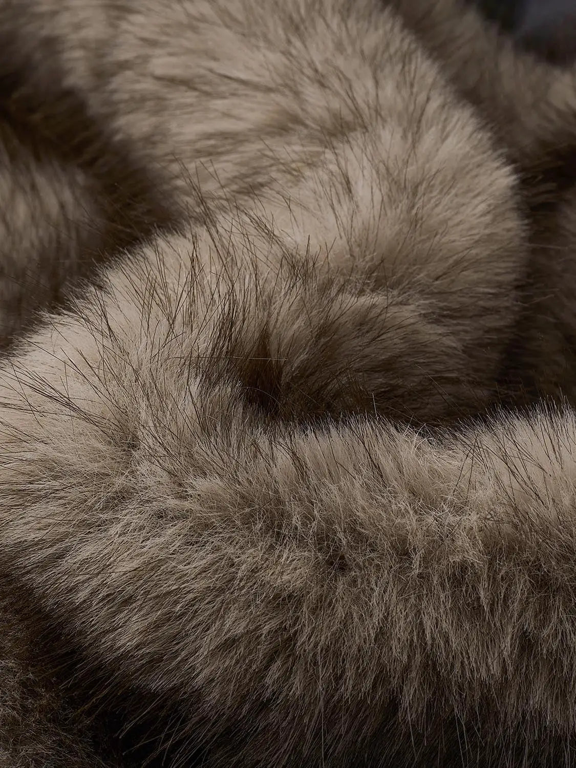 Jacket fur coat close-up in gray-brown fur by Urban Revivo Fashion.