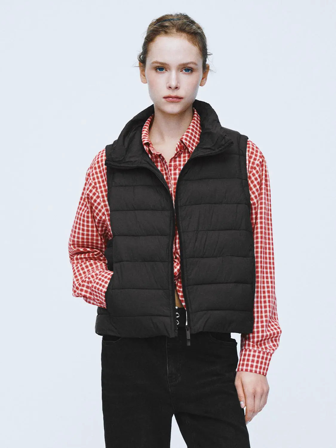 Padded jacket, black quilted vest worn over red checkered shirt by Urban Revivo Fashion