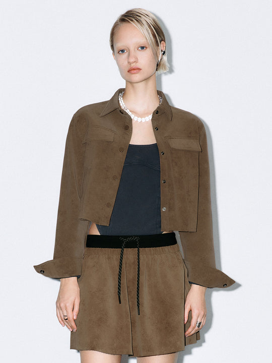 Camicie con tasca a patta accorciata