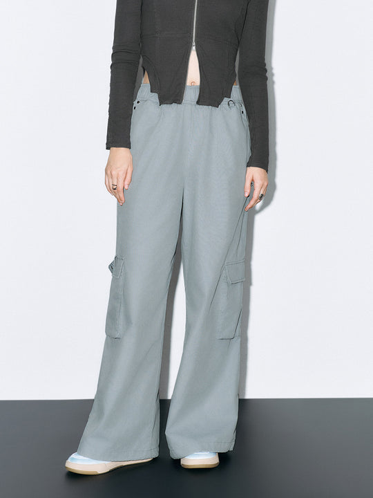 Pantaloni a gamba larga con tasca elastica a patta