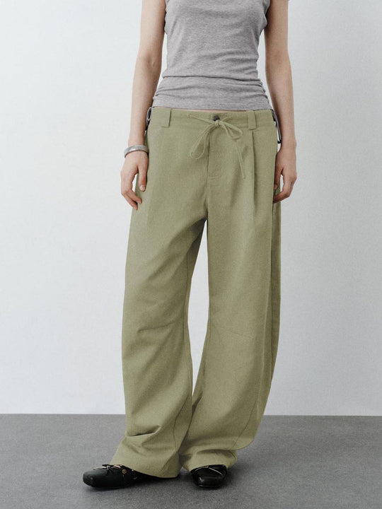 Pantalon à jambes courbées