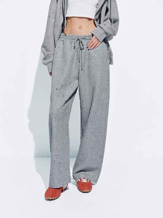 Pantaloni a gamba larga con motivo a stelle e vita elasticizzata