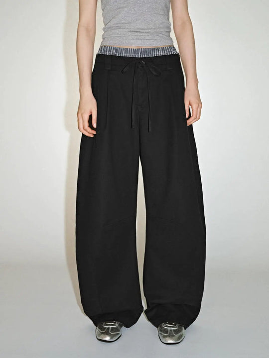 Pantalons à jambes larges avec bordure contrastée