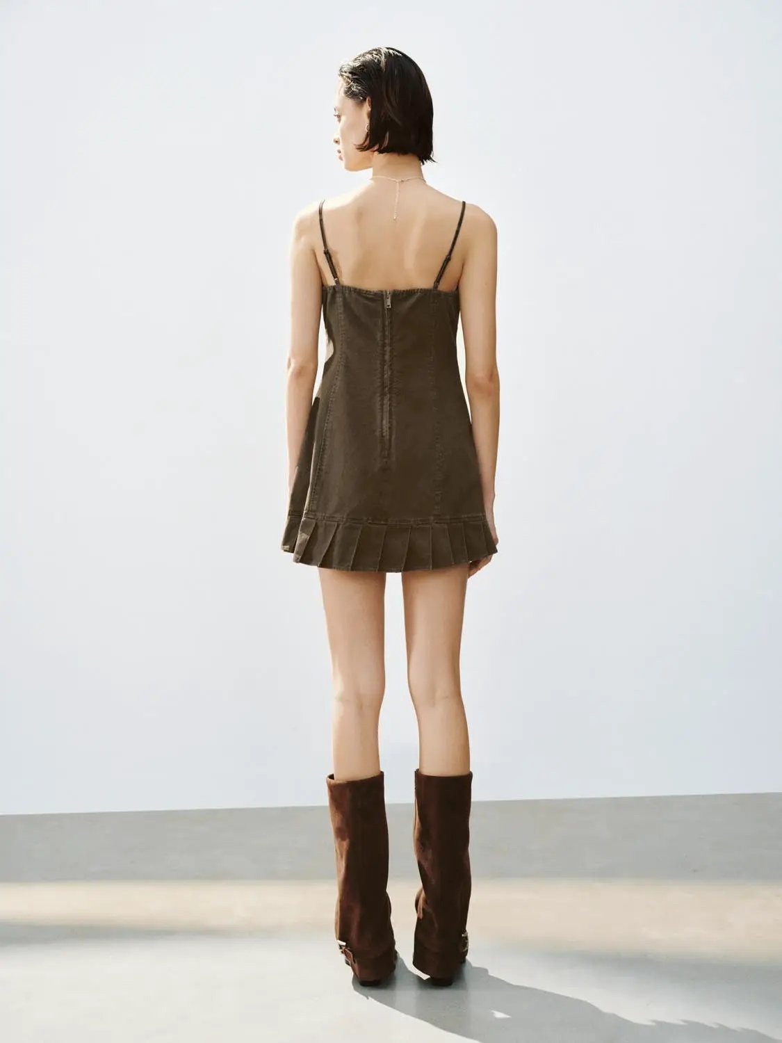 A-Line Dress in dark olive with thin spaghetti straps and a pleated hem