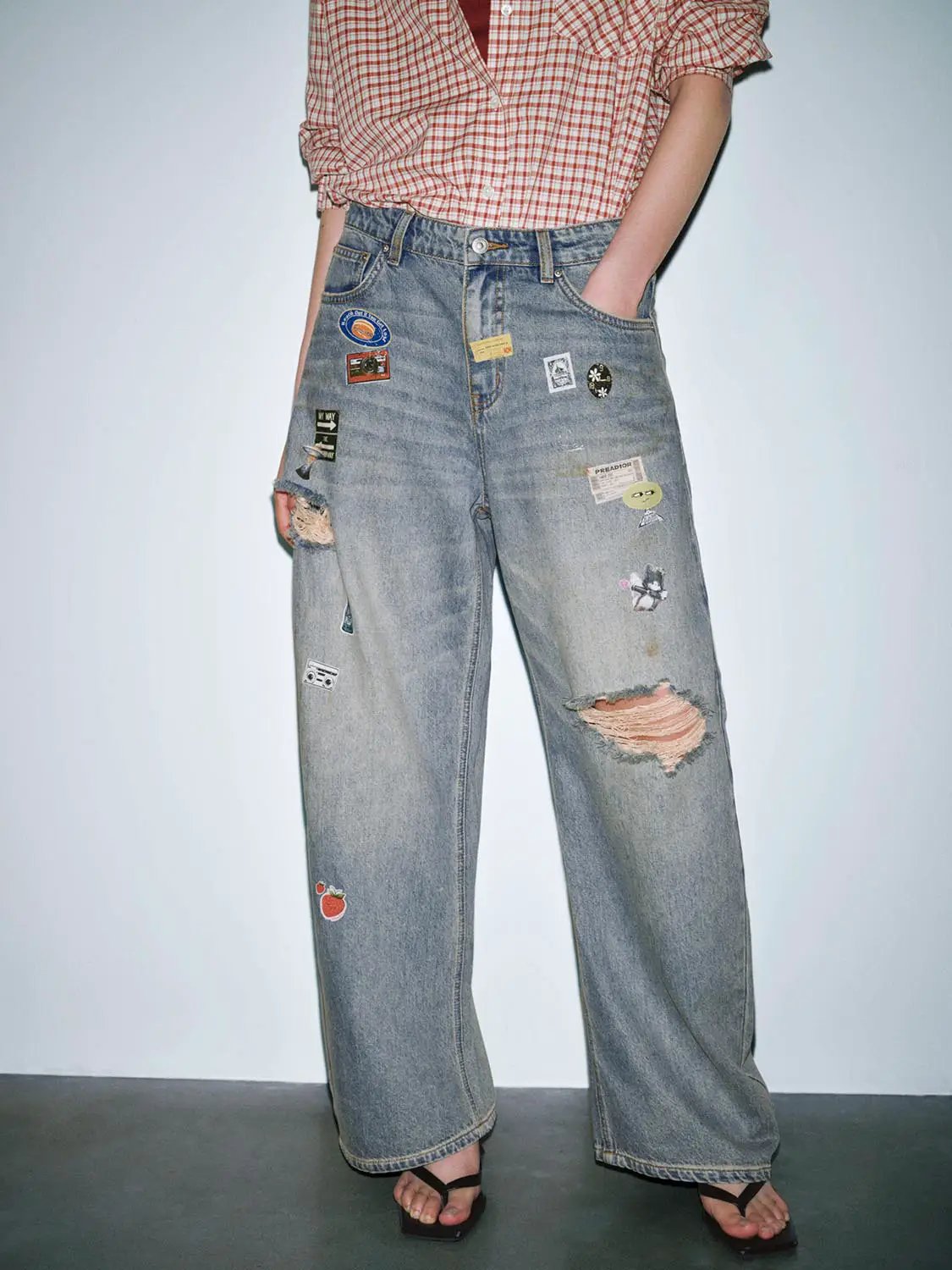 Patchwork Raw Detail Barrel Leg Jeans by Urban Revivo Fashion with patches and ripped knees in light wash denim