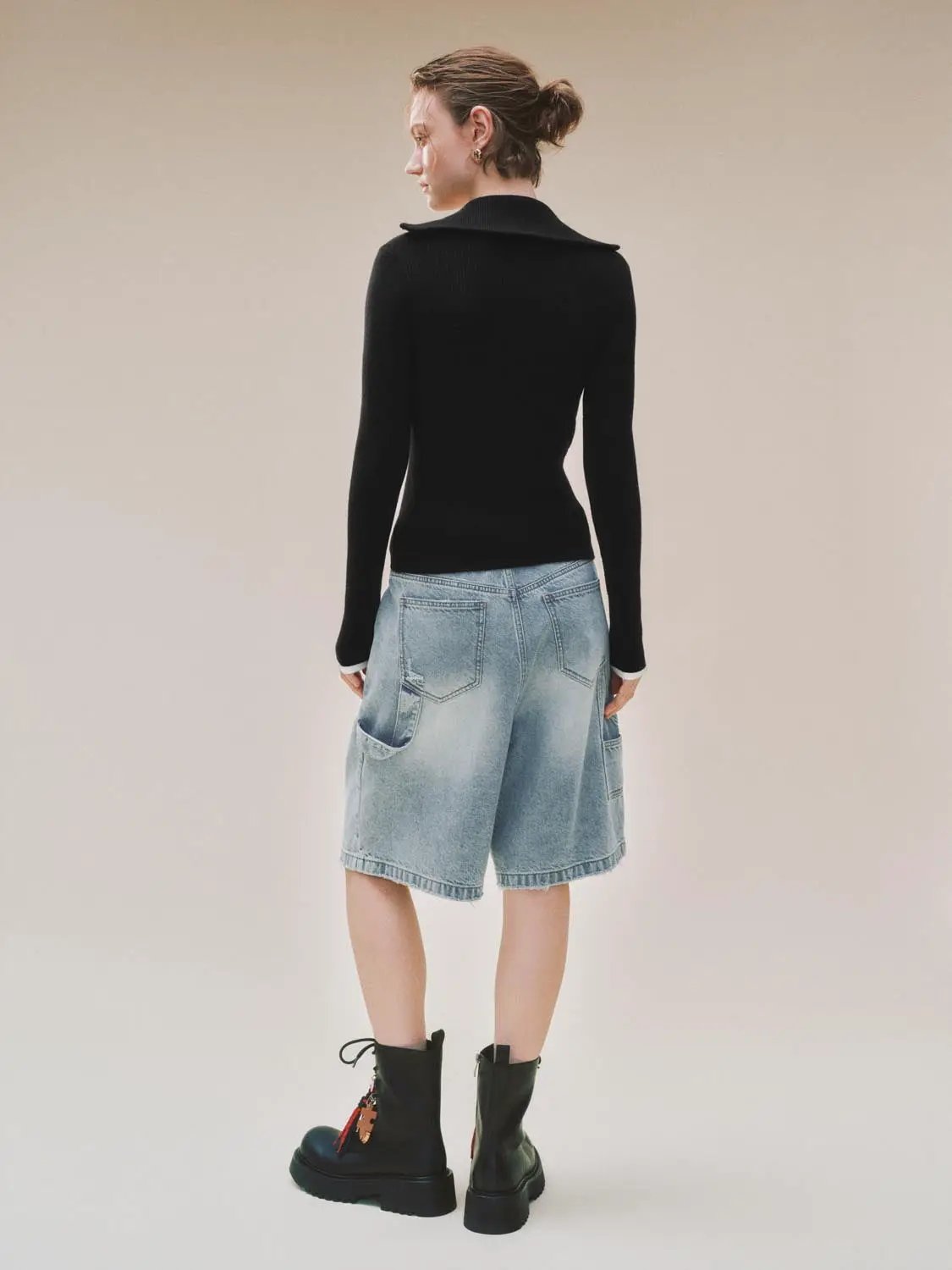 Knit T-Shirts black knitted top on model, back view, paired with light-wash denim shorts, Urban Revivo Fashion