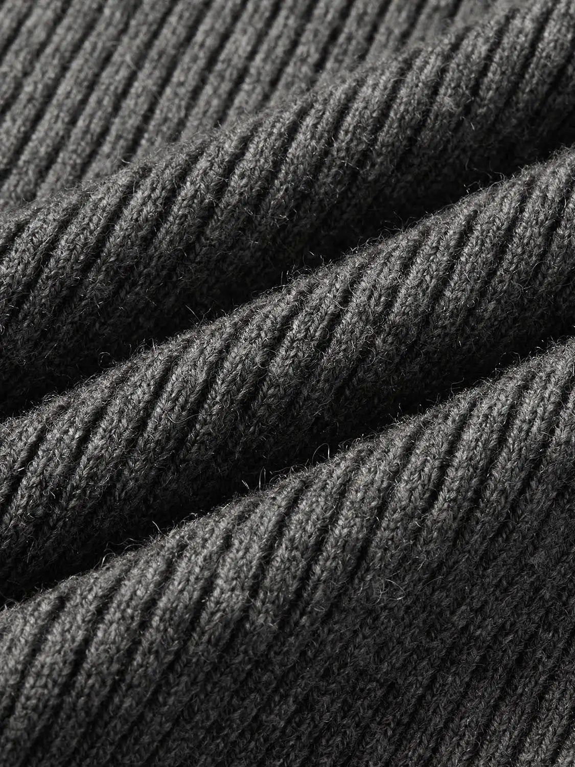 Knitted T-Shirt fabric close-up in charcoal gray, showing ribbed knit texture and soft fibers
