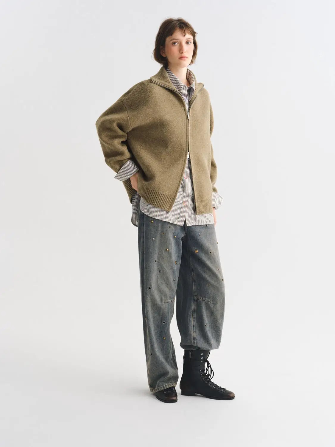 Knit jacket; tan oversized cardigan with zip closure.
