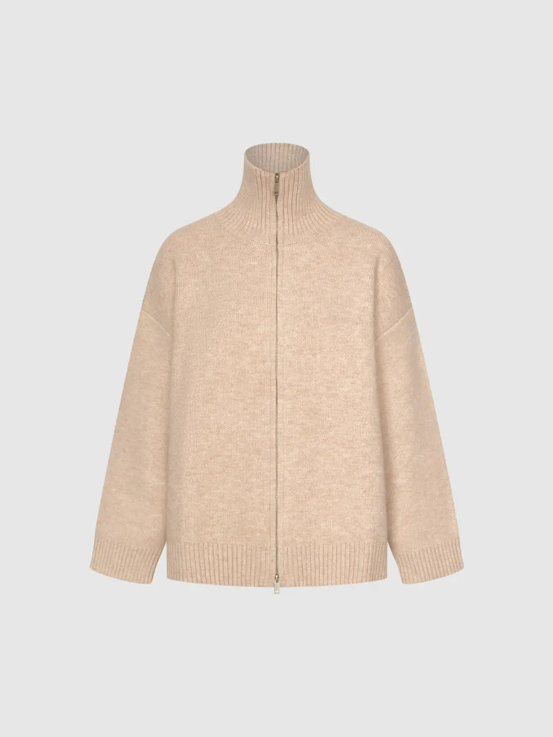 Beige knit cardigan with full zip front and ribbed cuffs, oversized fit.