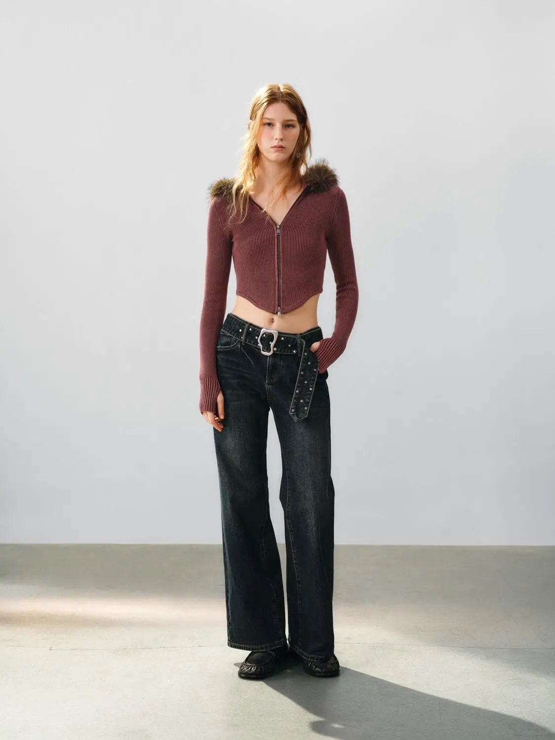 Knit jacket cropped cardigan in burgundy ribbed knit with front zip and faux-fur shoulder details.
