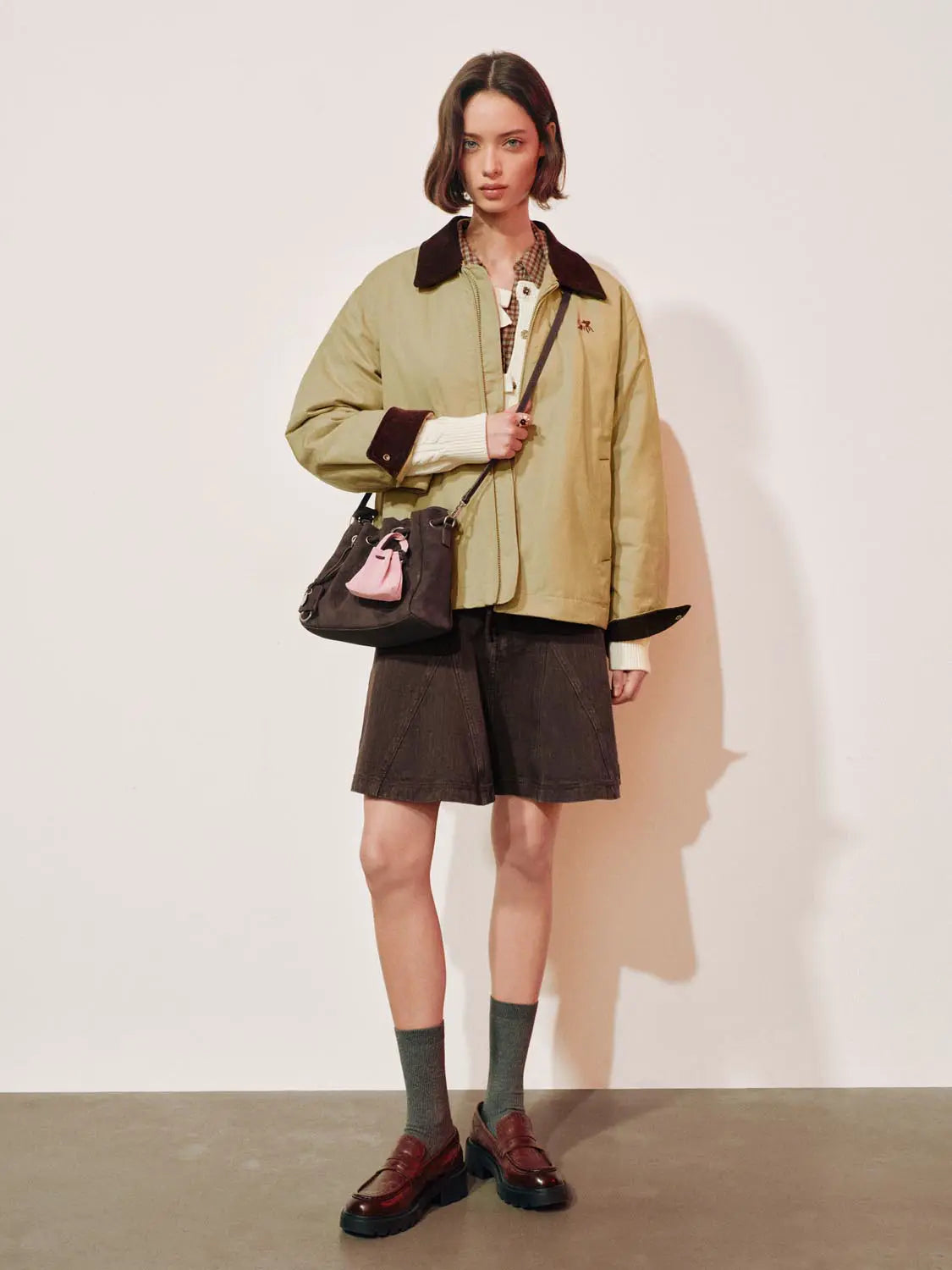 Padded jacket by Urban Revivo Fashion in beige with dark brown collar and cuffs.