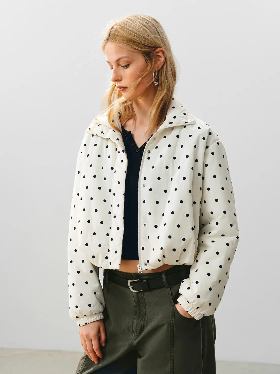 Padded Jacket(UR) white with black polka dots, cropped zip-front with elastic cuffs.