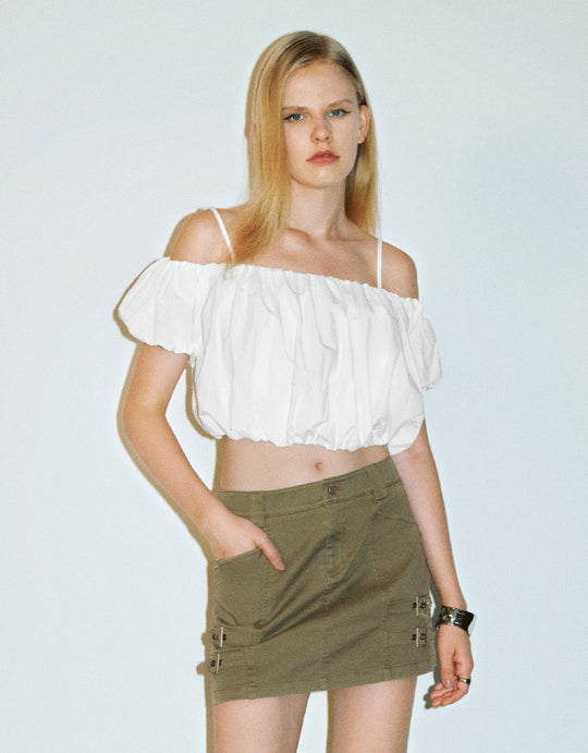 Top con spalline scoperte