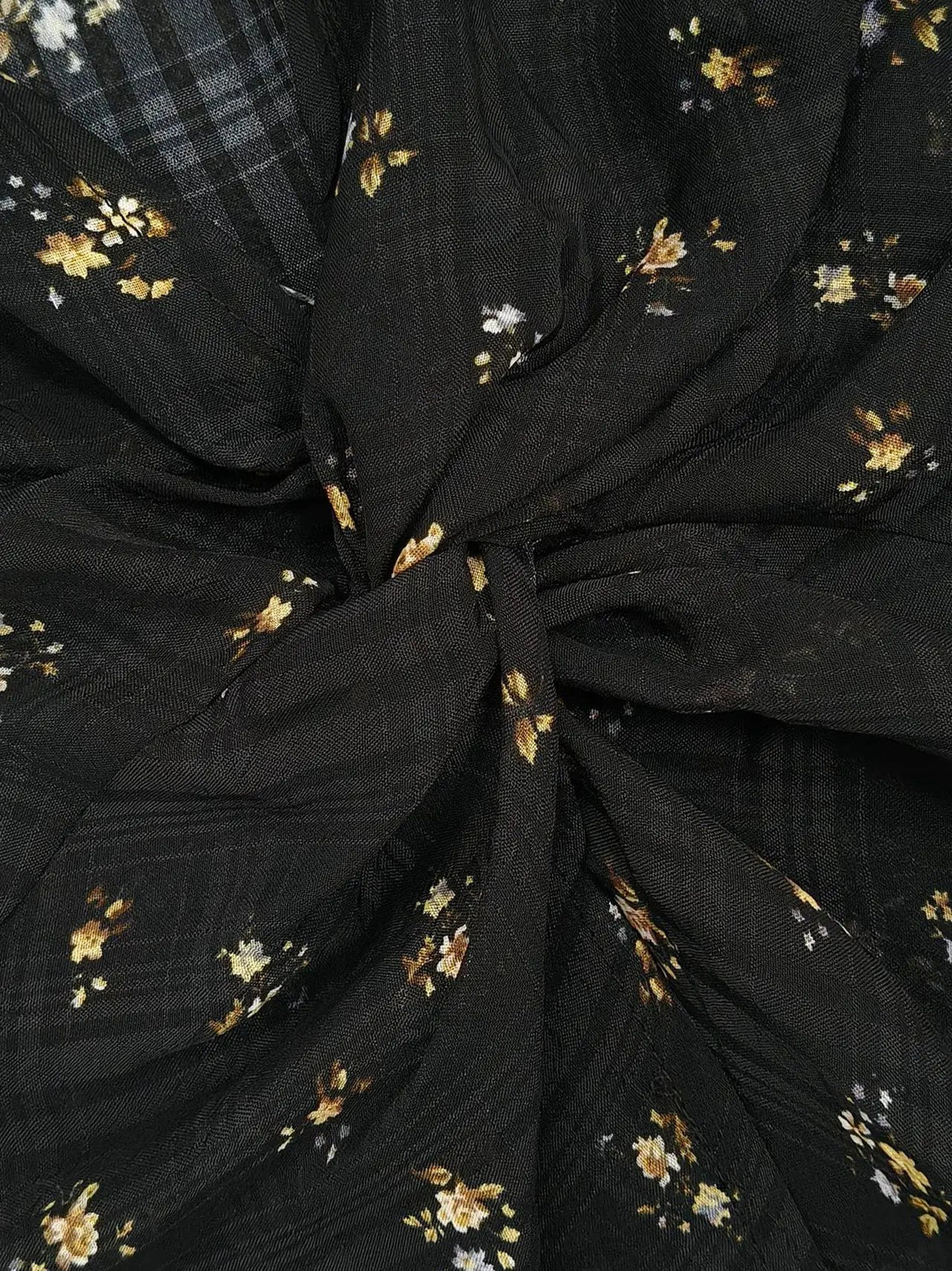 Black twist-knot floral sheer lightweight blouse with small yellow flowers
