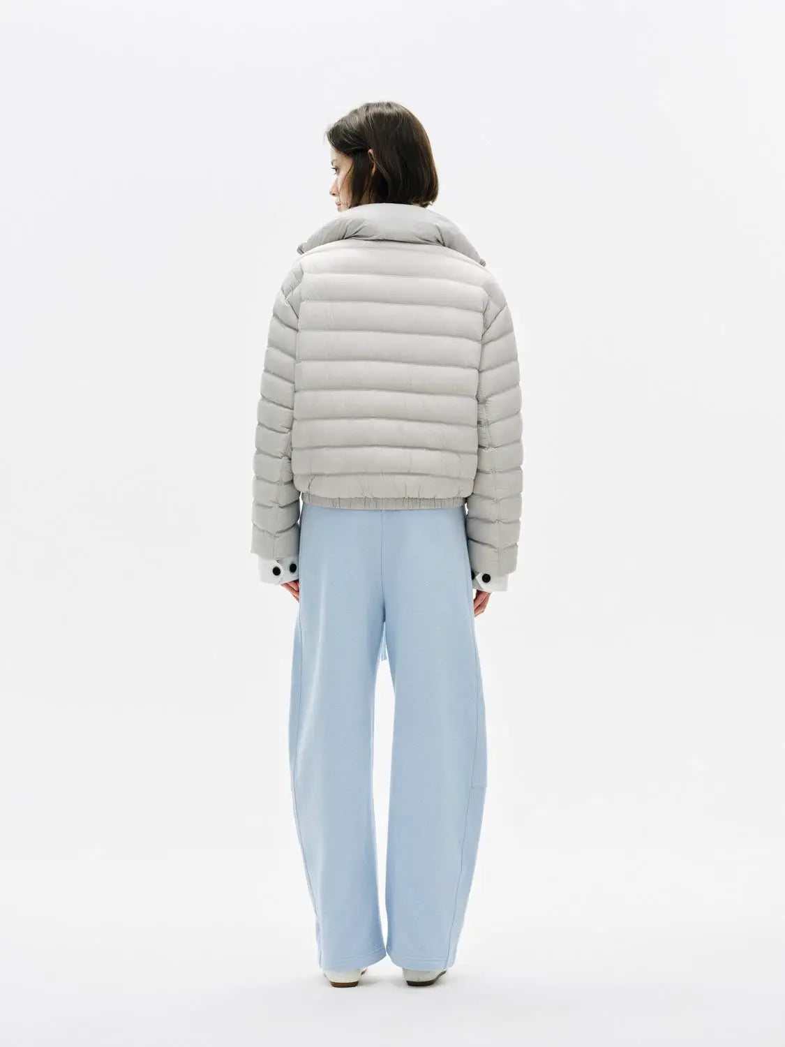 Barrel-leg pants; two-piece outfit with gray puffer jacket and light-blue pants by Urban Revivo Fashion