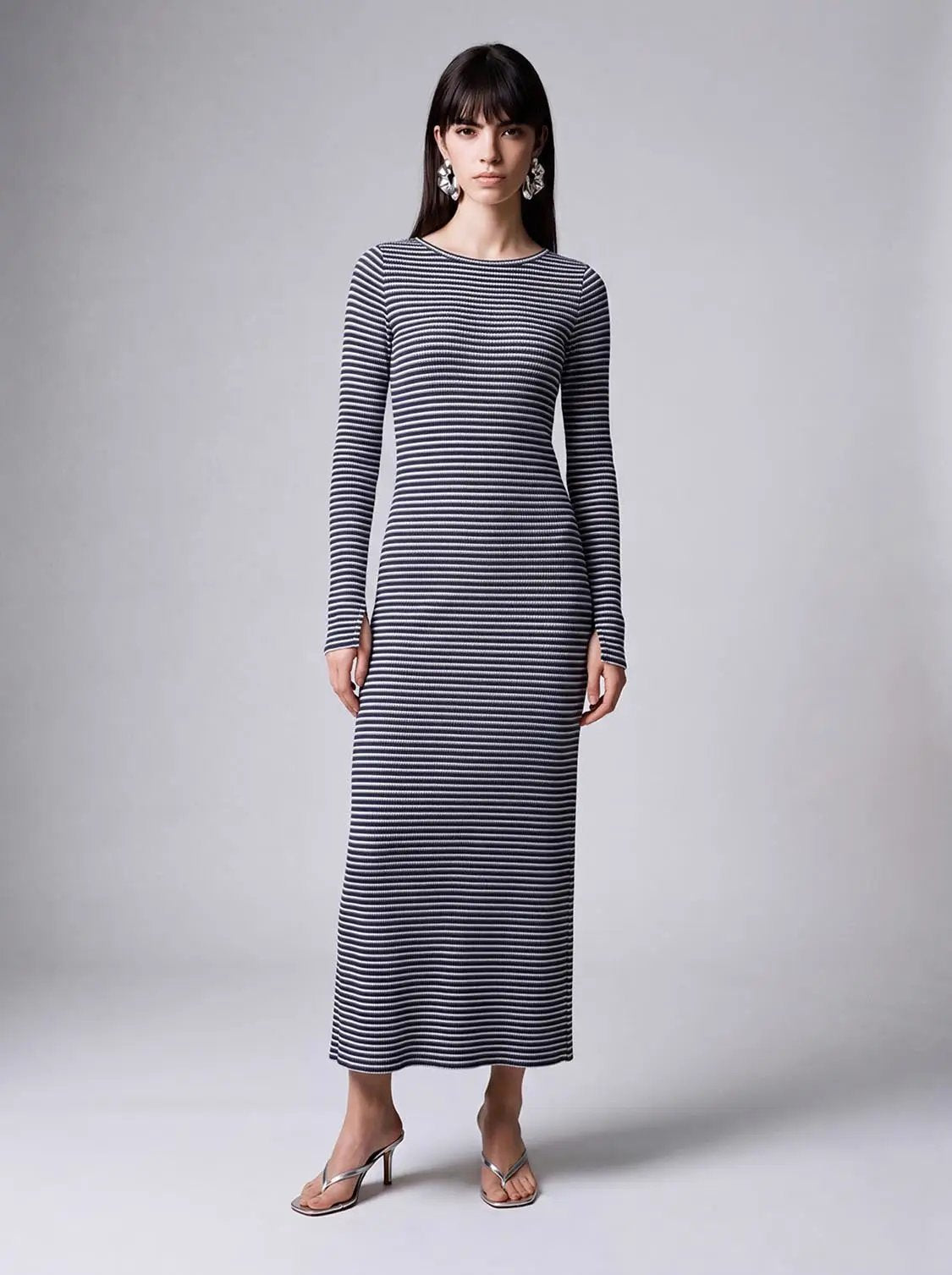 Back Cut-Out Striped Maxi Dress by Urban Revivo Fashion, navy and white striped knit, long-sleeve, full-length.