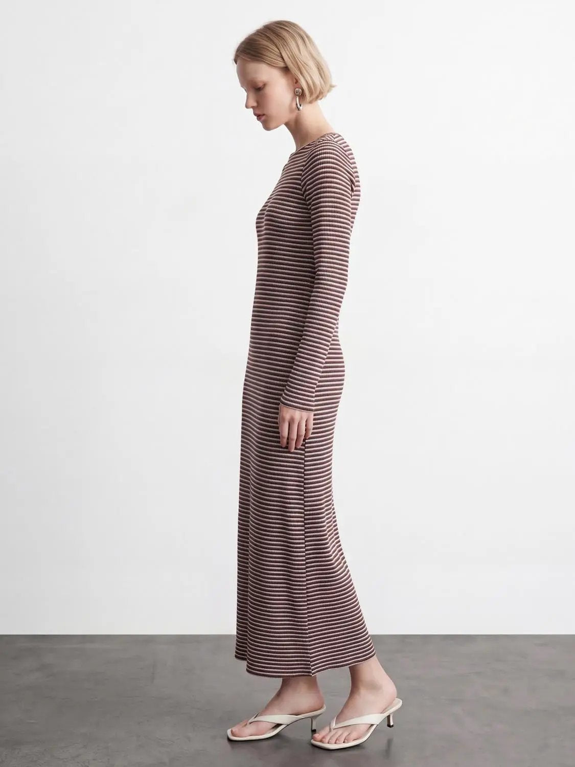 Back Cut-Out Striped Maxi Dress; brown and cream horizontal stripes, long-sleeve, ankle-length on model