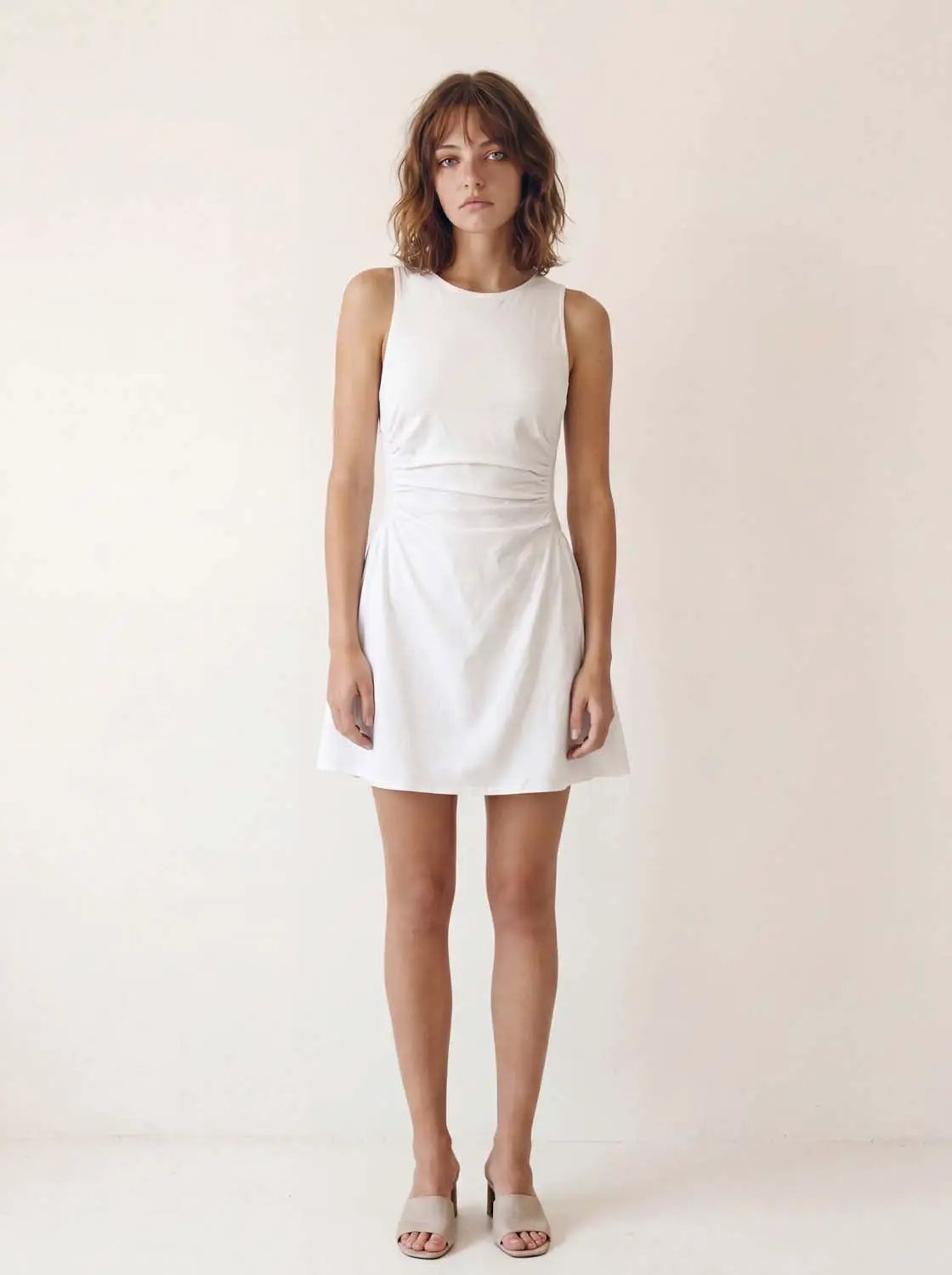 A-Line dress, white sleeveless knee-length worn by model