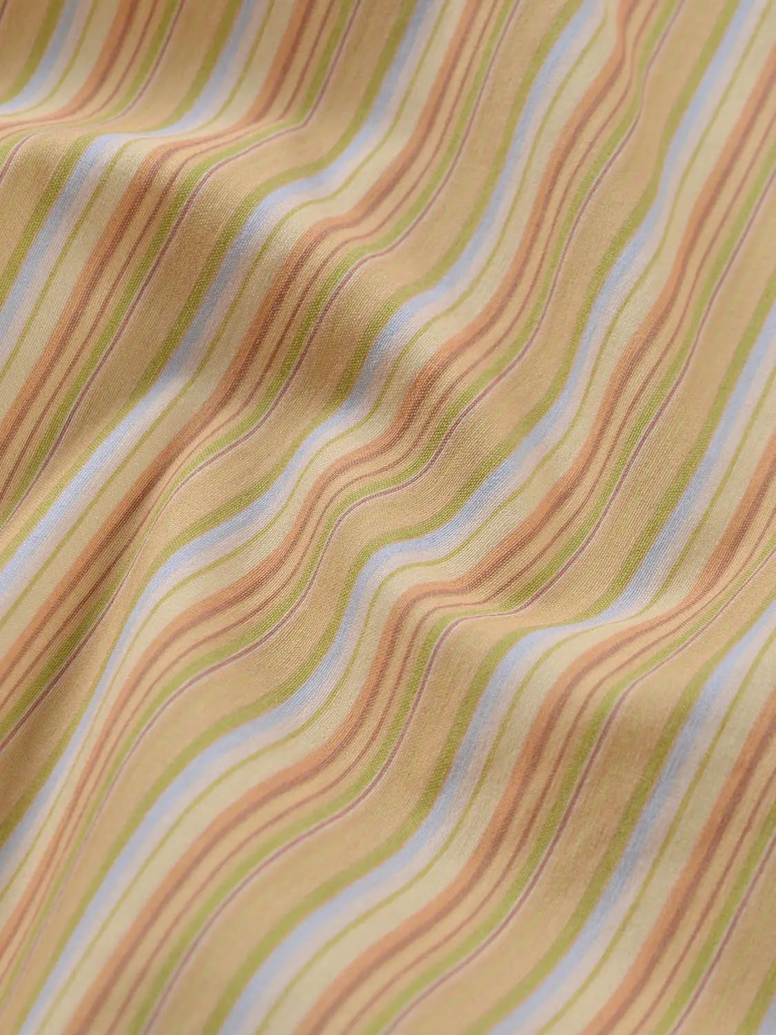 A-Line Dress fabric with pastel striped pattern in peach, green, blue, and beige.