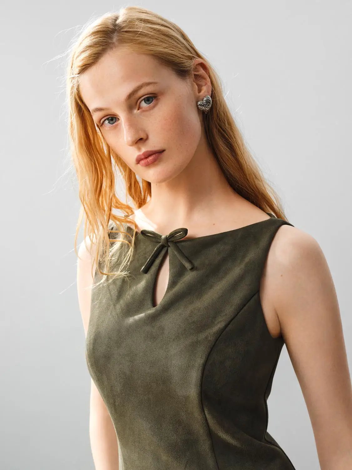Ruffle Hem Bow Detail Sleeveless A-Line Mini Dress in olive green suede-like fabric; Urban Revivo Fashion