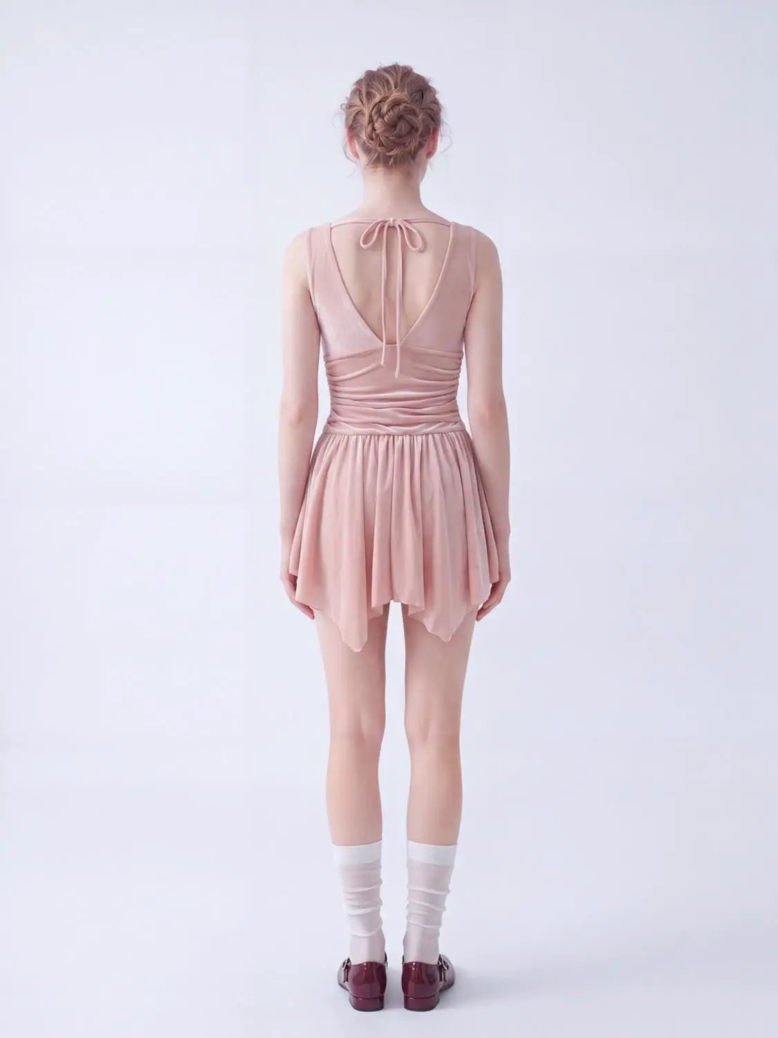A-Line Dress in dusty pink with back tie neckline and ruched waist.