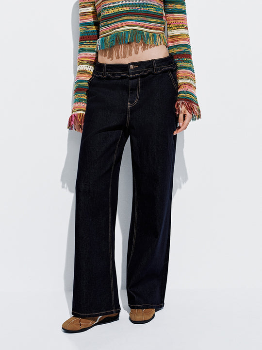 Jeans a zampa con orlo arricciato