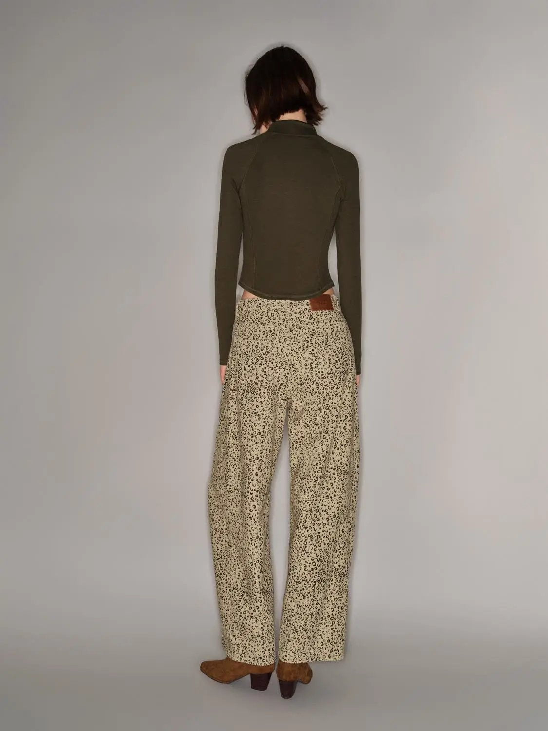 Casual jeans in leopard print, beige with black spots, wide-leg silhouette