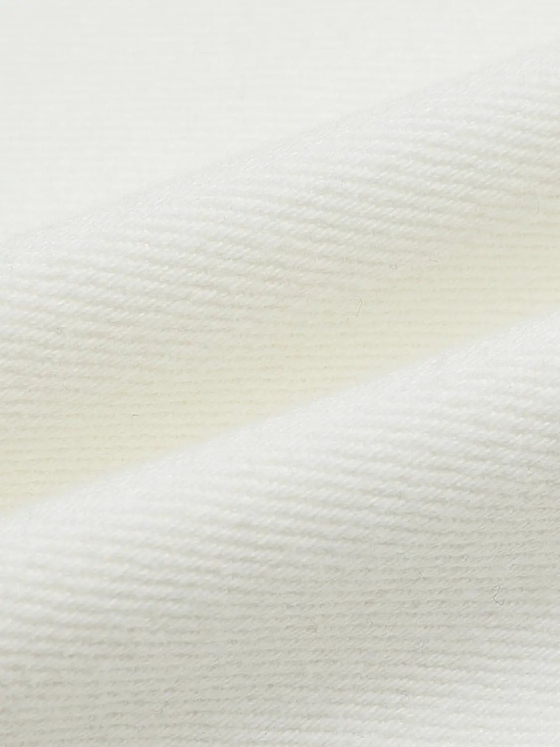 Casual Jeans fabric close-up in white denim by Urban Revivo Fashion.