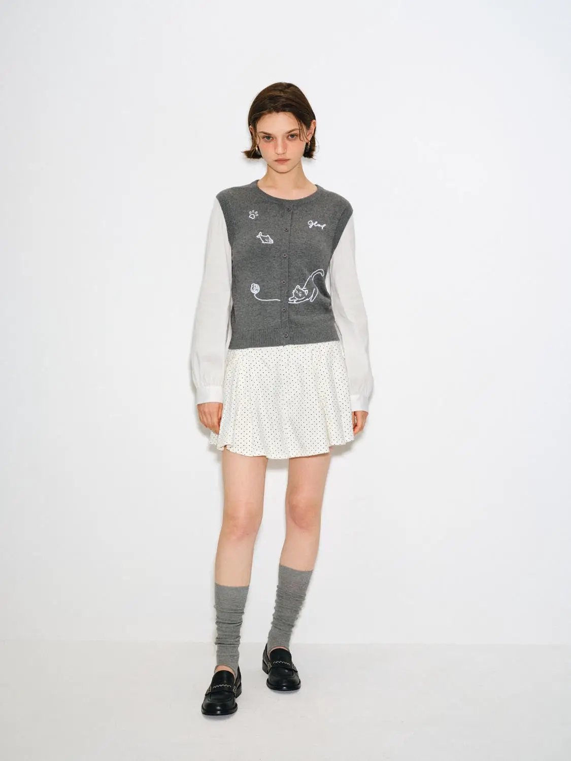 Knit T-Shirt by Urban Revivo Fashion: grey knitted bodice with white long sleeves.