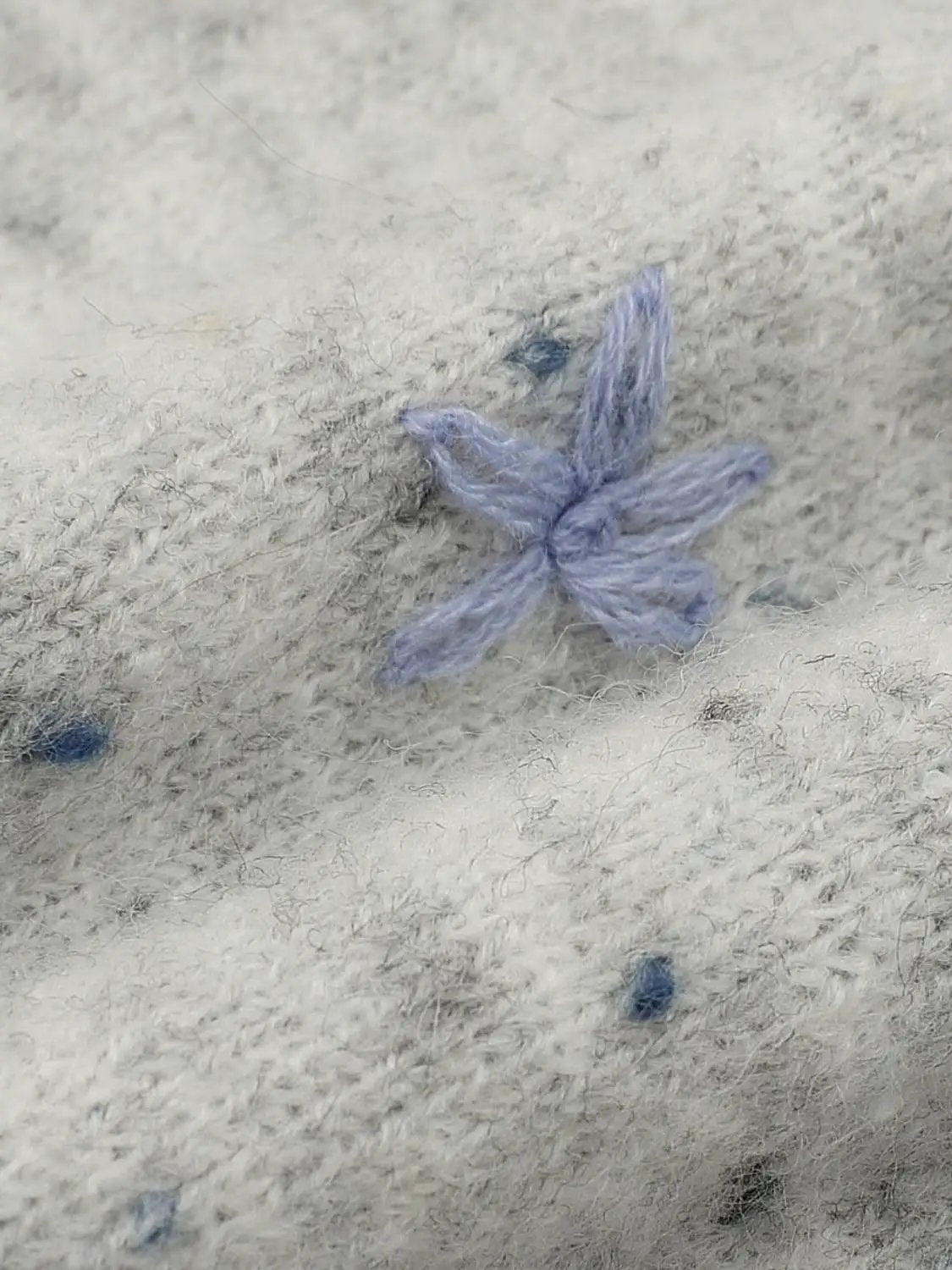 Embroidered floral knit polo sweater; light gray fuzzy fabric with lavender embroidery accent