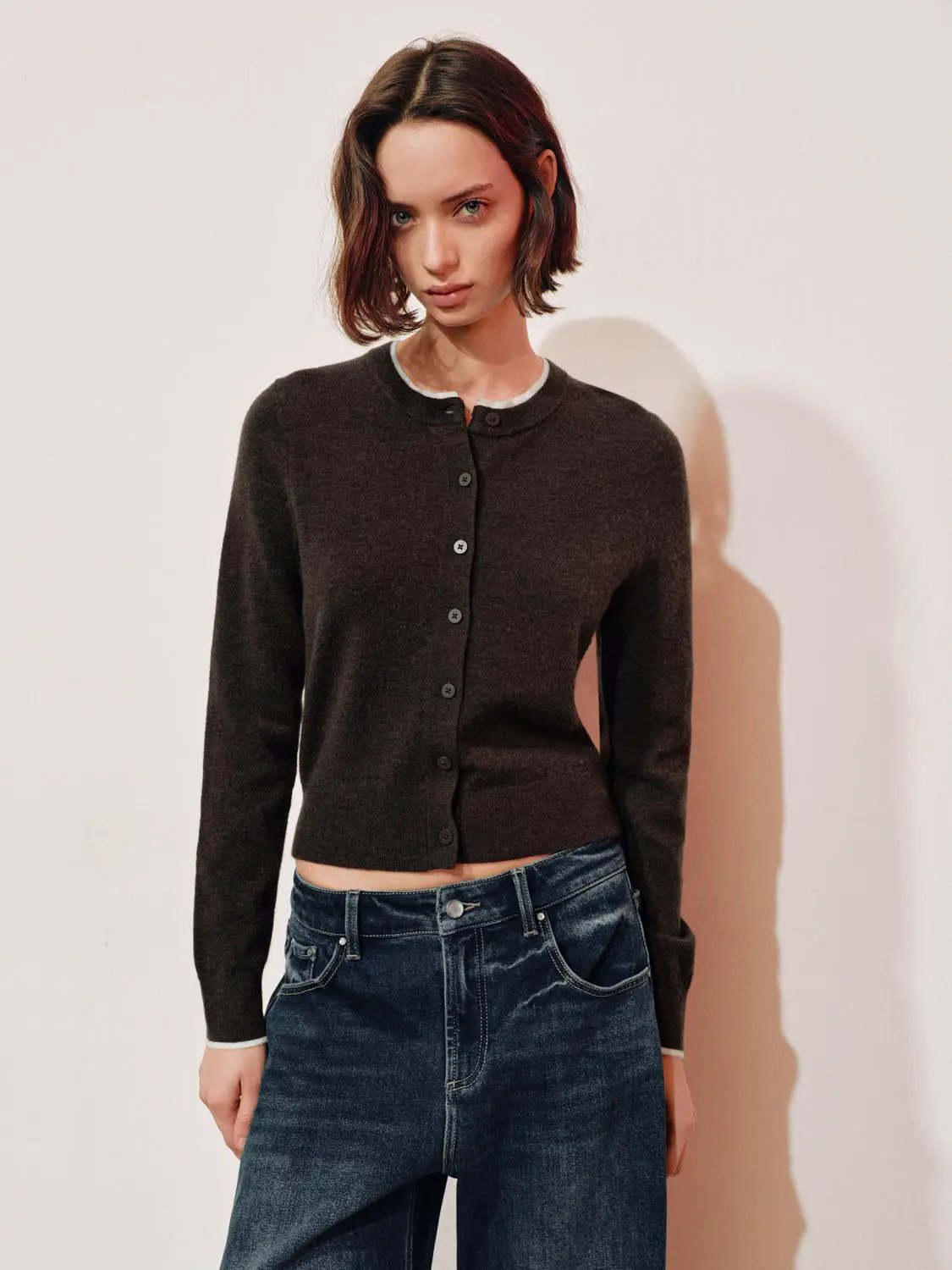 Knitted cardigan with button-front closure, dark brown knit, long sleeves, cropped hem
