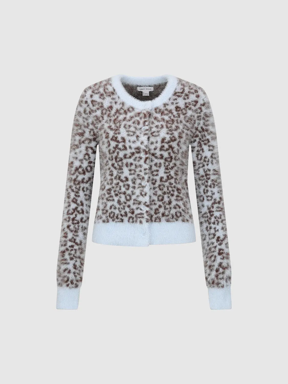 Knit cardigan with brown leopard print on white, ribbed white cuffs and hem